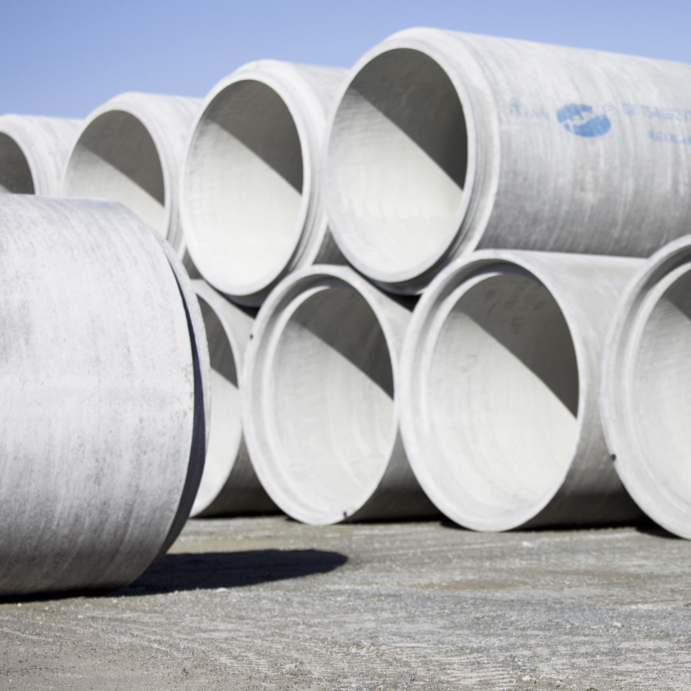 Humes Large diameter Spun concrete pipe stacked