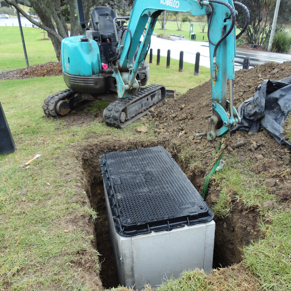 Humes Telco Pit with concrete chamber being installed