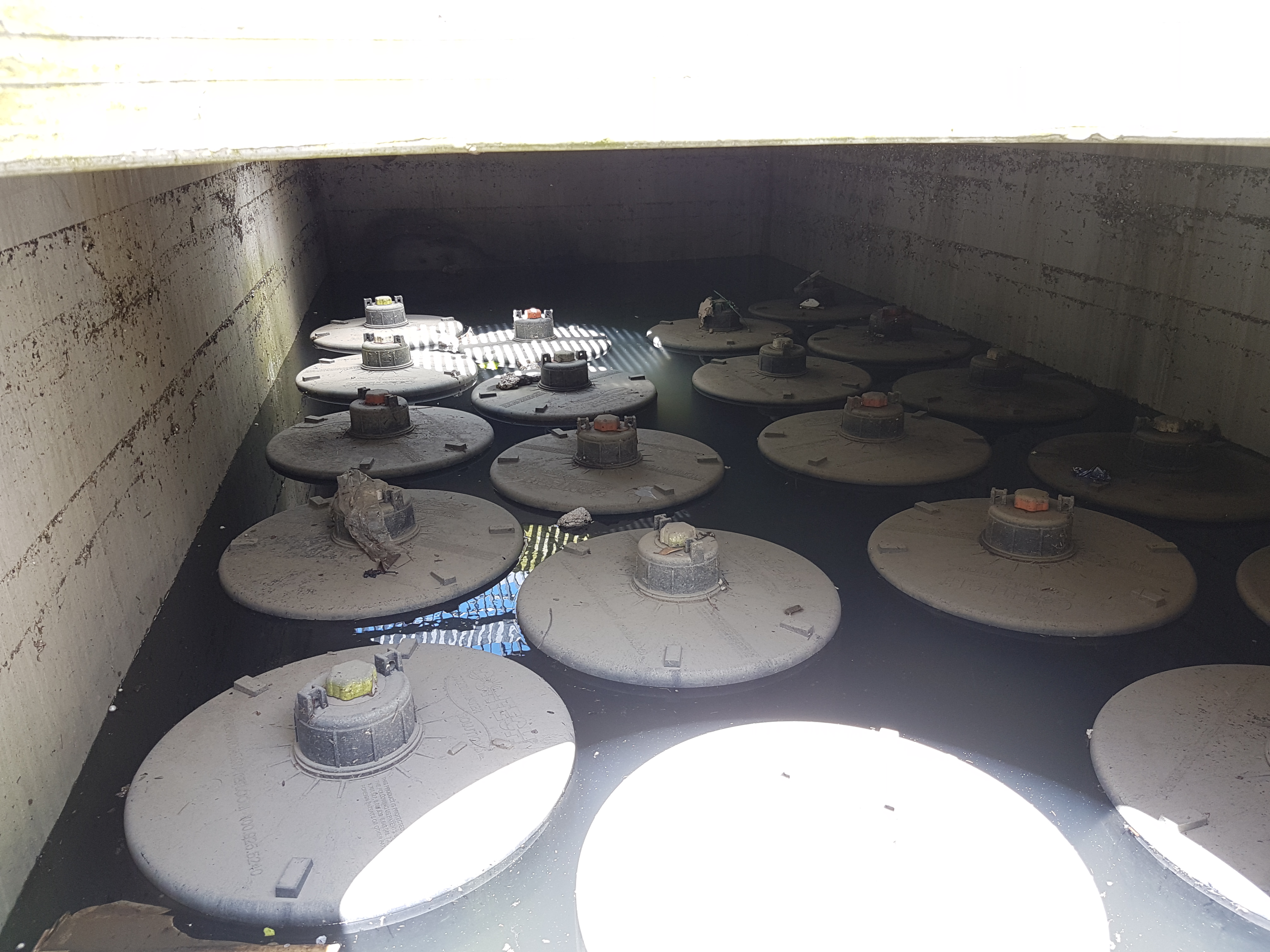 Stormfilter in ground with water 3695