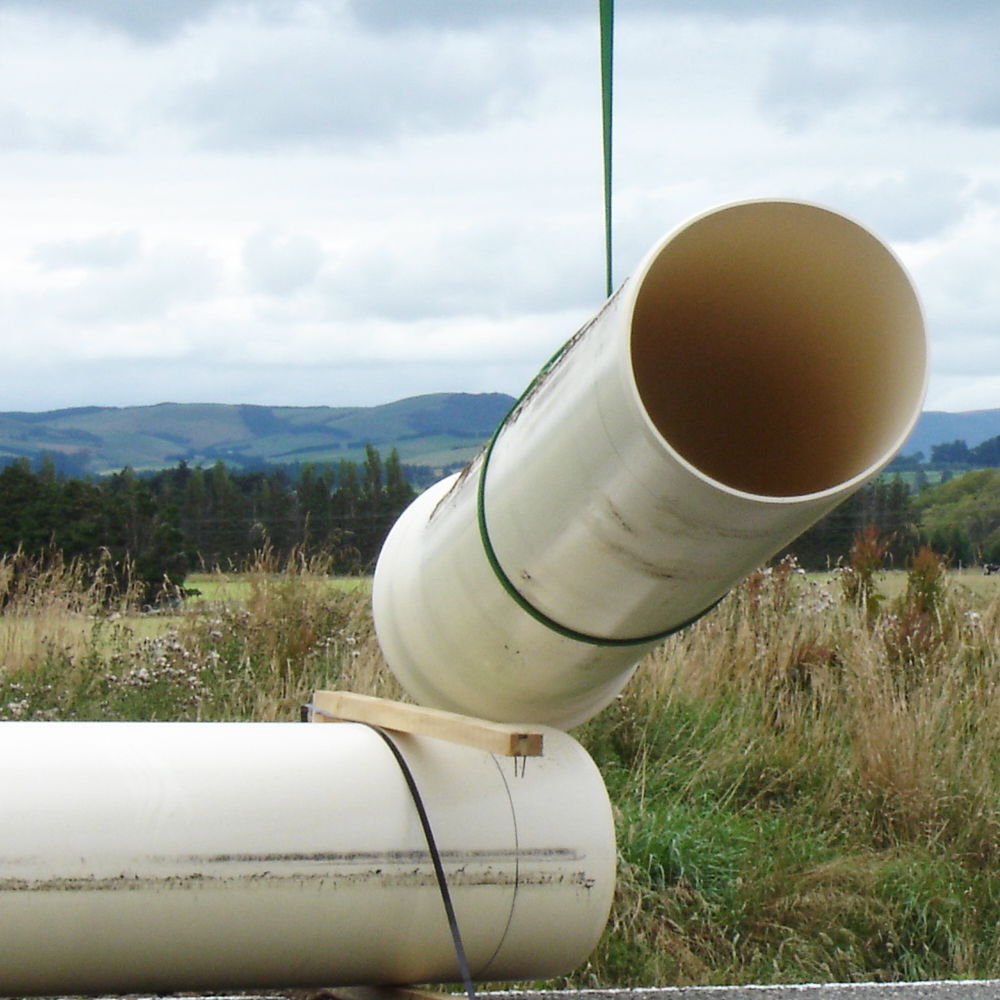 Humes Iplex PVC Pipe being moved into place for pressure pipeline